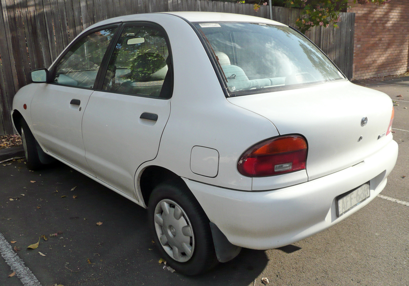 Whereas the Autozam Revue had a truncated tail, tiny lights, and a very stubby overhang